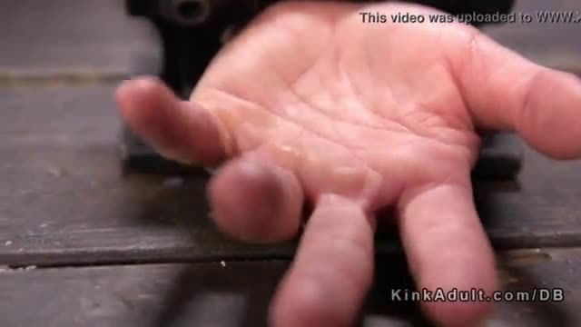 Busty brunette fingered in device bondage